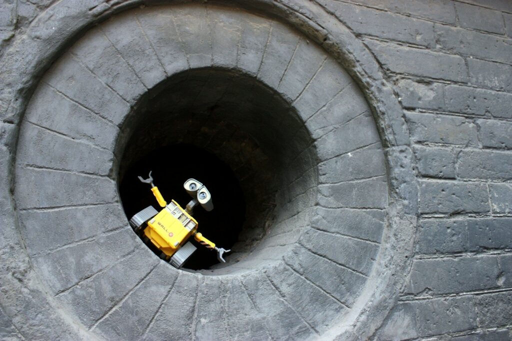there is a small yellow object in the middle of the tunnel